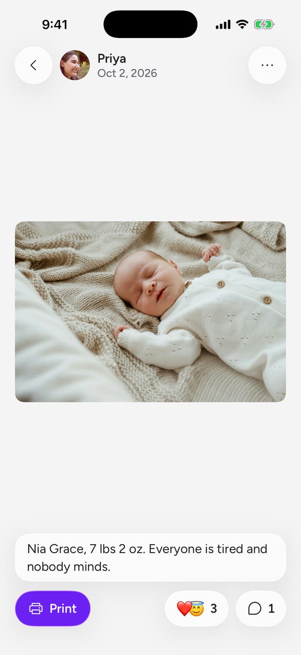 A PhotoJoy post of a newborn, shared with family